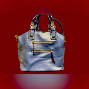 Blue Tote/Crossbody bag. 2 front pockets. Adjustable shoulder strap. Gently used